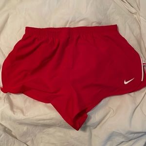 Red Nike shorts